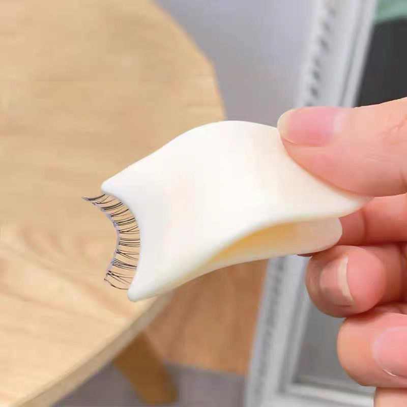 Applikator für falsche Wimpern